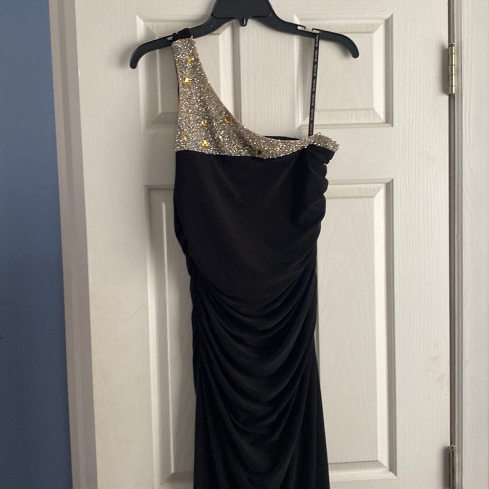 One shoulder full length dress.